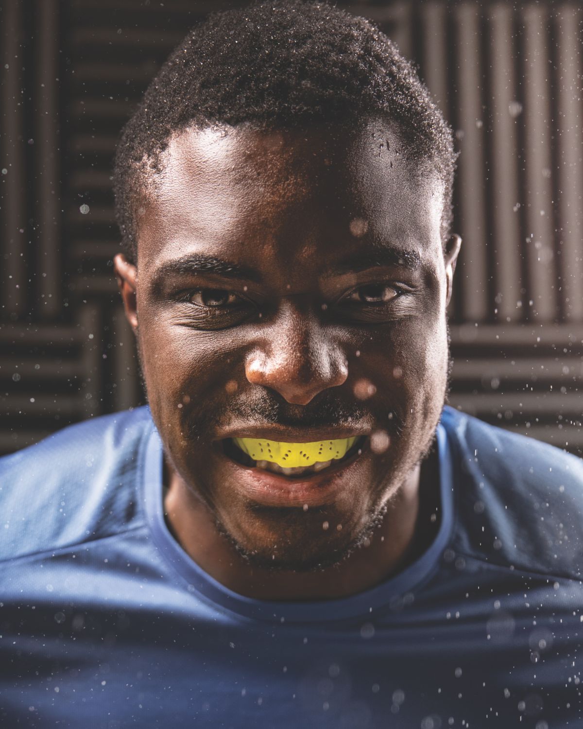 Athlete wearing a yellow SISU mouthguard